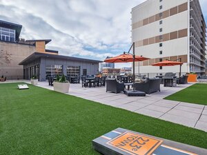 Cornhole Area | 223 E Town Apartments