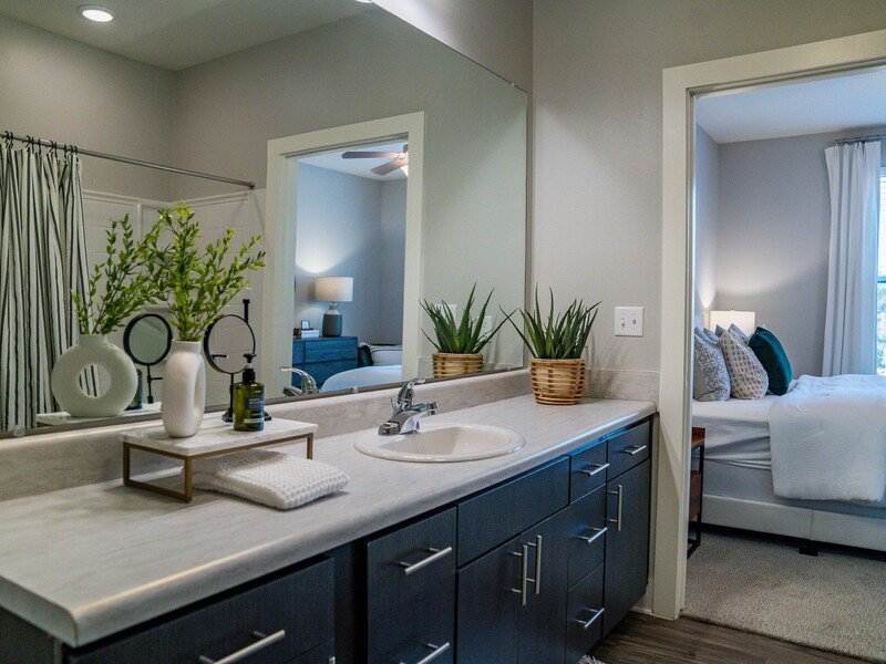 Bathroom and Bedroom | Atlantic on the Boulevard Apartments in North Charleston, SC