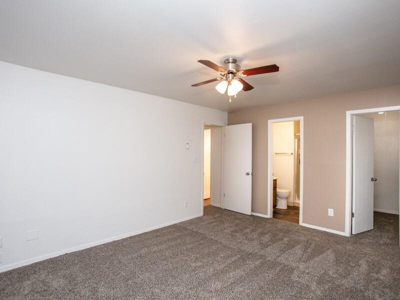 Bedroom with a Ceiling Fan | 2x1.5 - 928 | Foxhill Apartments in Casper, WY
