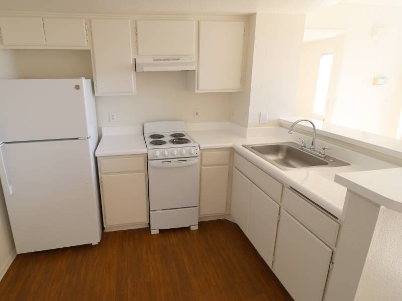 Kitchen with Wood Flooring | Harmony Court Senior Living