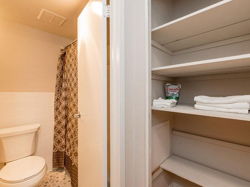 Linen Closet and Bathroom | Fort Chaplin Park Apts in Washington, D.C.