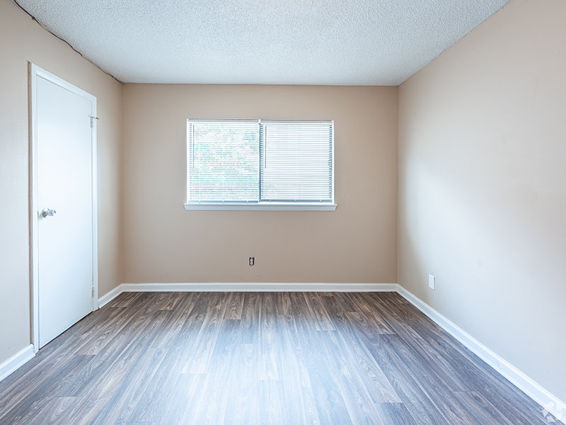 Bedroom with Wood Style Flooring | The Regency Apartments