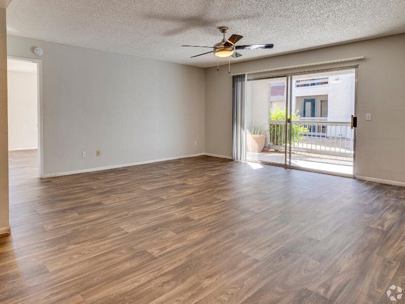 Furnished apartment living area shown — representative home at Ventana Palms.
