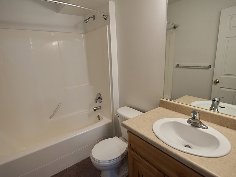 Bathroom with Sink and Bathtub and Bathroom Mirror | Autumn Hills Apartments
