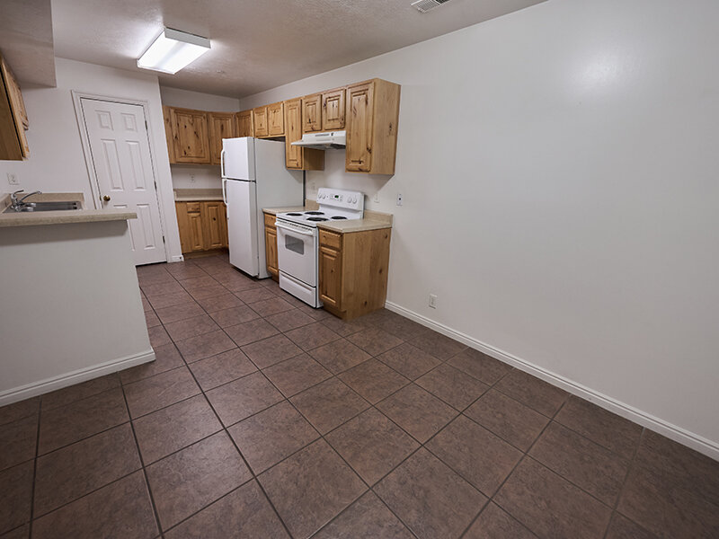 Kitchen with Ceiling Lights and Tile Flooring | Autumn Hills Apartments