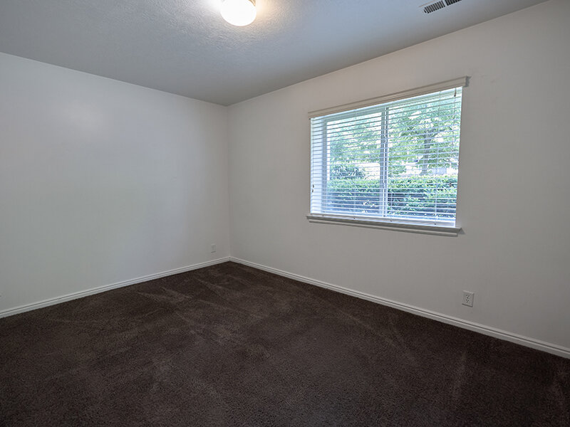 Bedroom with Window and Ceiling Light | Autumn Hills Apartments