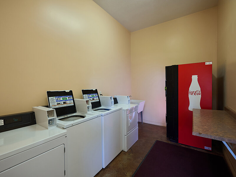 Community Washer/Dryer with Soda Machine | Autumn Hills Apartments
