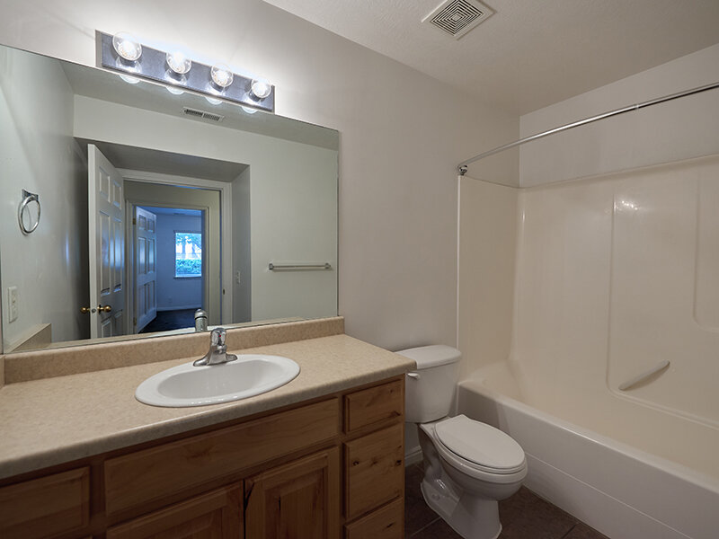 Bathroom with Mirror and Shower | Autumn Hills Apartments