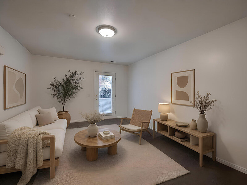 Living Room with Ceiling Light and Wall Art | Autumn Hills Apartments