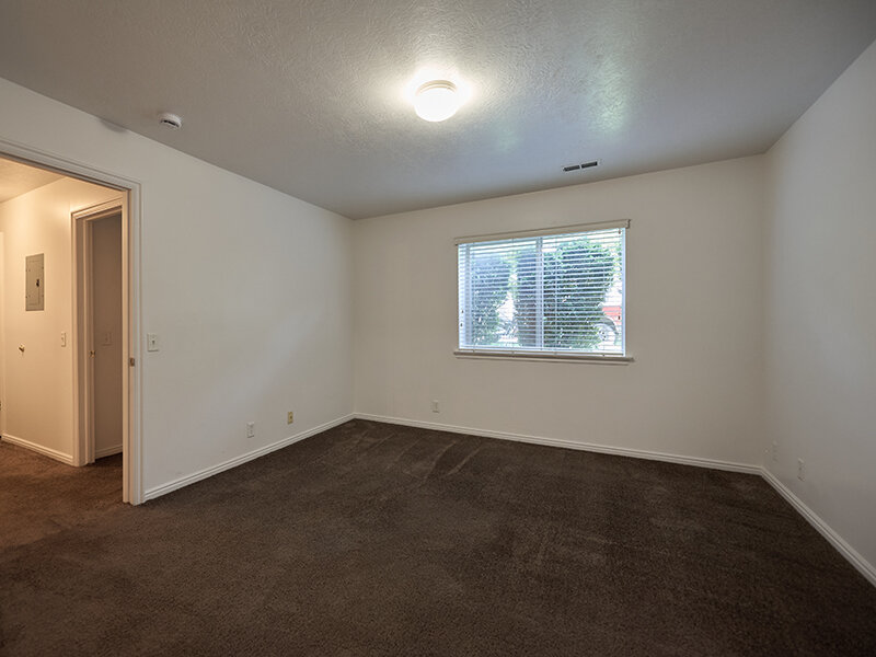 Apartment Bedroom with Window and Blinds | Autumn Hills Apartments