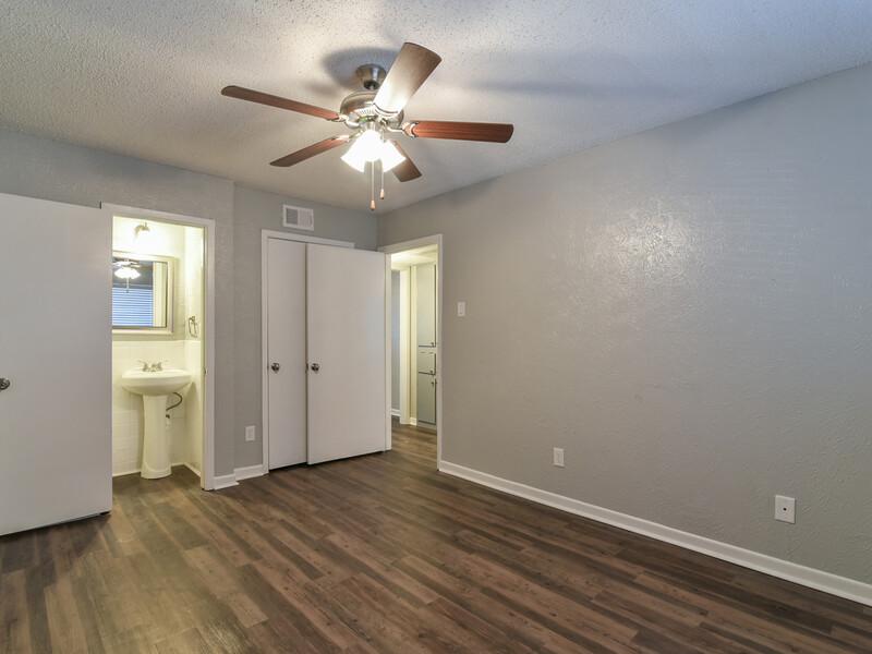 Bedroom with a Ceiling Fan | Avalon Apartments in Arlington, TX