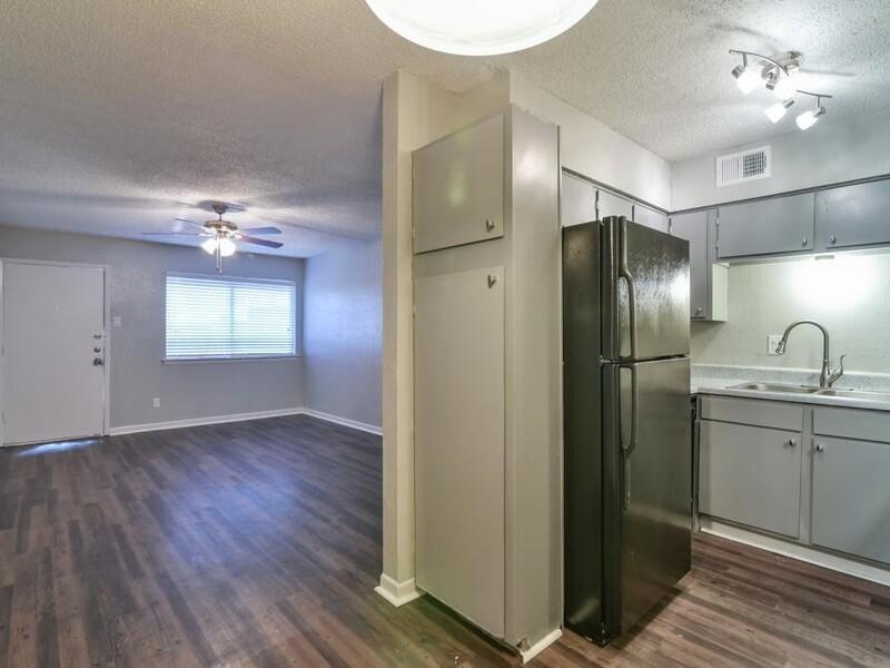 Kitchen and Living Room | Avalon Apartments in Arlington, TX