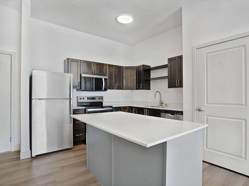 Kitchen with Kitchen Island | Canyon View Crossing Apartments in Orem, UT
