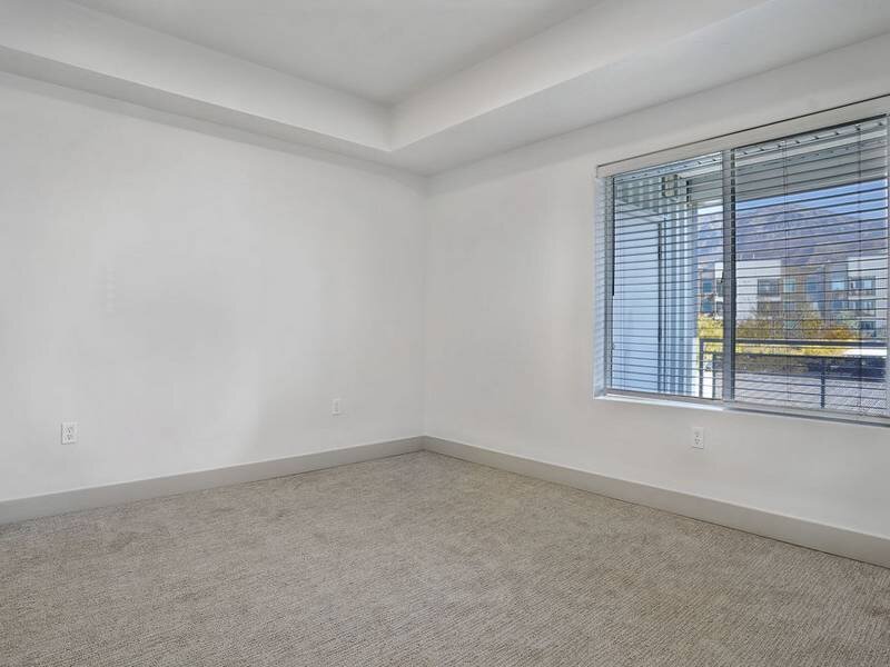 Carpeted Bedroom | Canyon View Crossing Apartments in Orem, UT