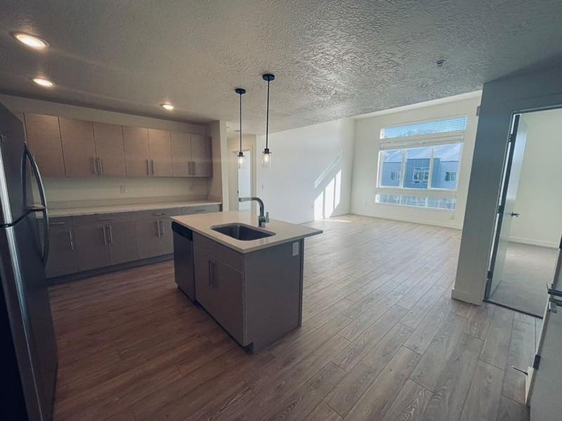 Living Room and Kitchen | Canyon Vista Apartments in Draper, UT