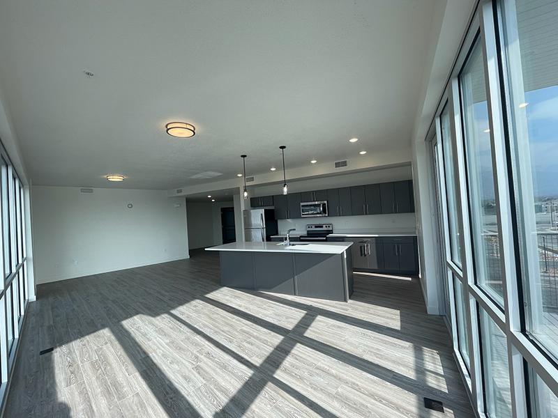 Kitchen and Front Room | Canyon Vista Apartments in Draper, UT