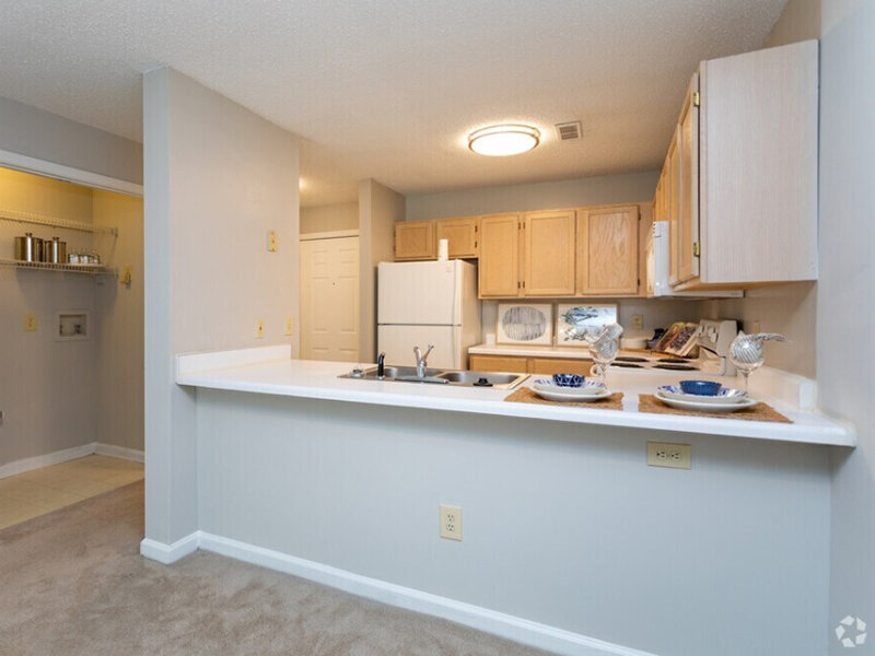 Kitchen and Breakfast Bar | Carolina Oaks Apartments