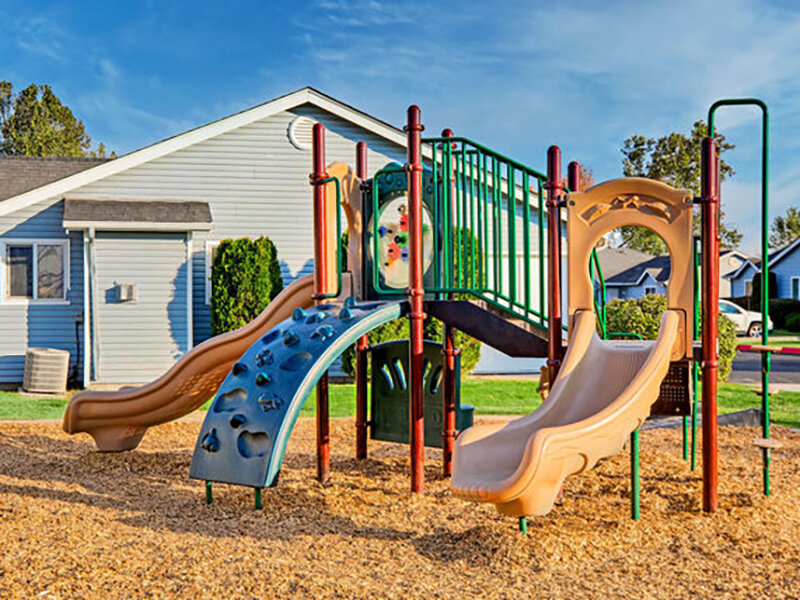 Playground with Slides | Casa Del Sol Apartments in Sunnyside, WA