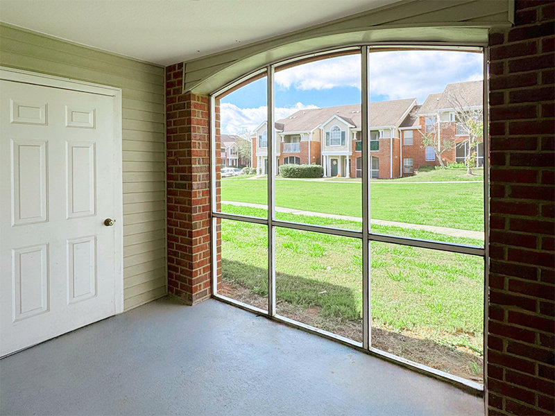 Screened Patio with Outdoor Storage Closet | Central Park Apartments