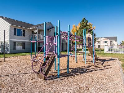 Playground with Slide | Chelsea Court Apartments in Idaho Falls, ID