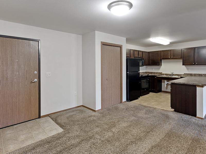 Entrance and Kitchen | Dakota Pointe Apartments in Sioux Falls, SD