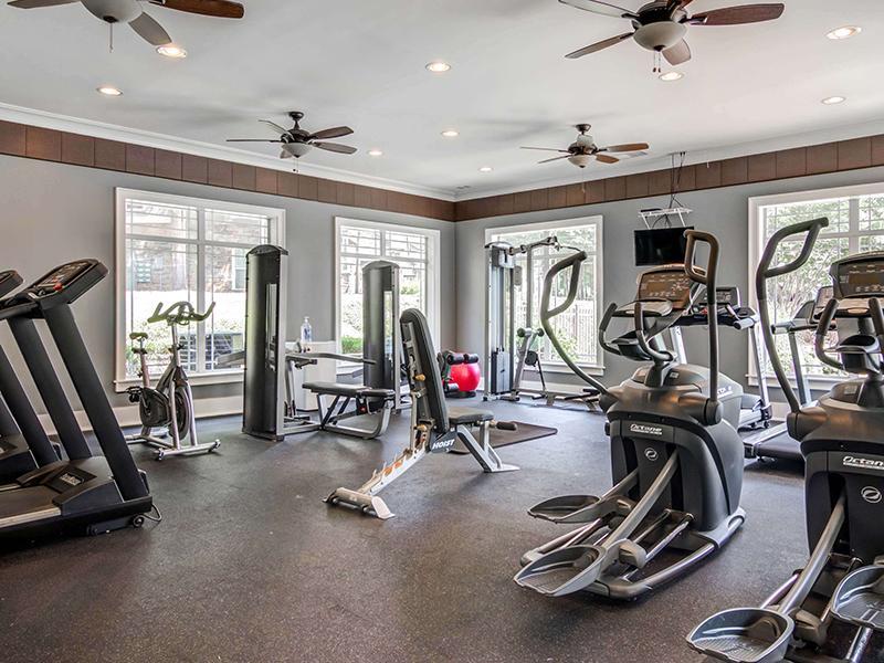 The fitness center is filled with cardio and weight lifting machines at Eagle's Brooke Apartments.