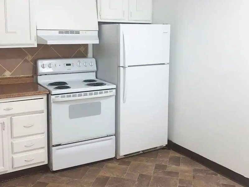 Kitchen with White Appliances | Eagle Watch