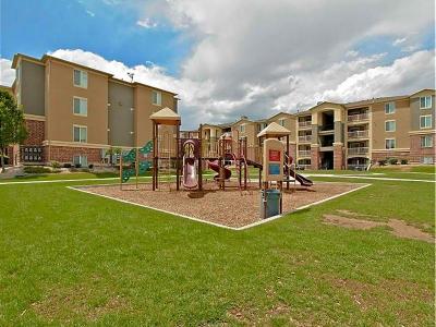 Exterior & Playground | eGate Apartments in West Valley, UT