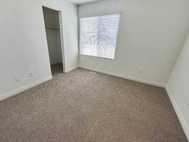 Bedroom with Sliding Door Closet | Garden View Townhomes