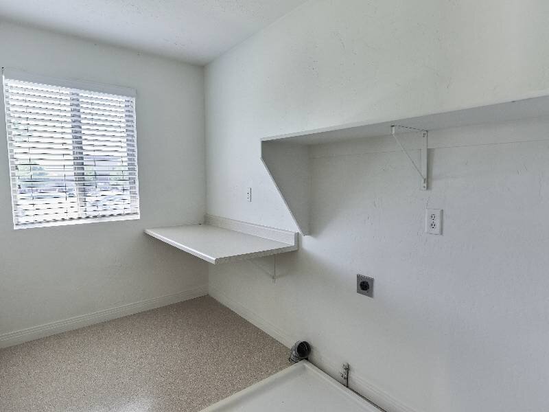 Room with Built In Shelving | Garden View Townhomes
