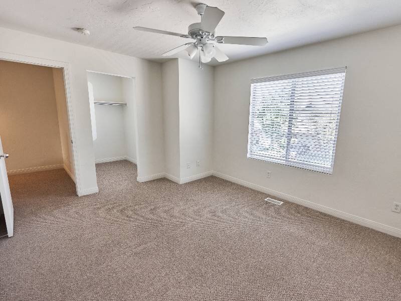Bedroom with Ceiling Fan | Garden View Townhomes