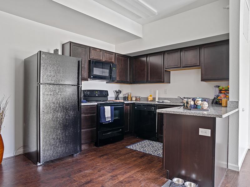 Kitchen with Black Appliances | Gateway Apartments in Rapid City, SD