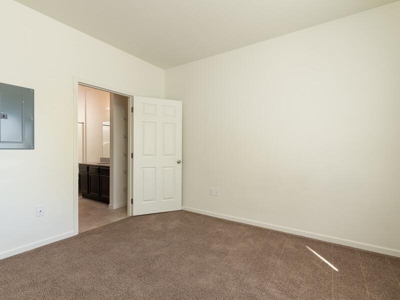 Carpted Bedroom | Gateway Apartments in Rapid City, SD