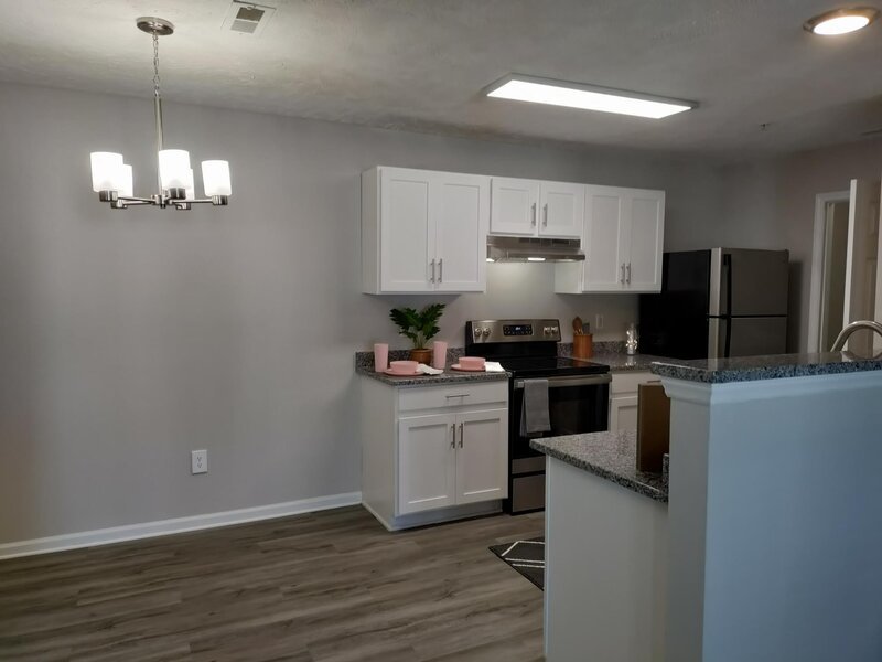 Dining Area and Kitchen | Hidden Lake Apartments in Fayetteville, NC