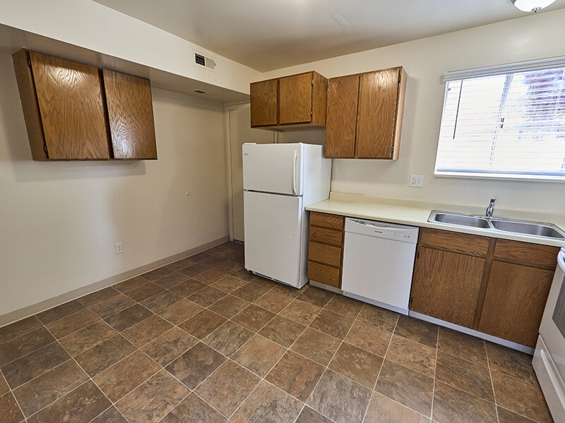 Apartment Kitchen with Window and Tile Flooring | Kaysville Country Townhomes