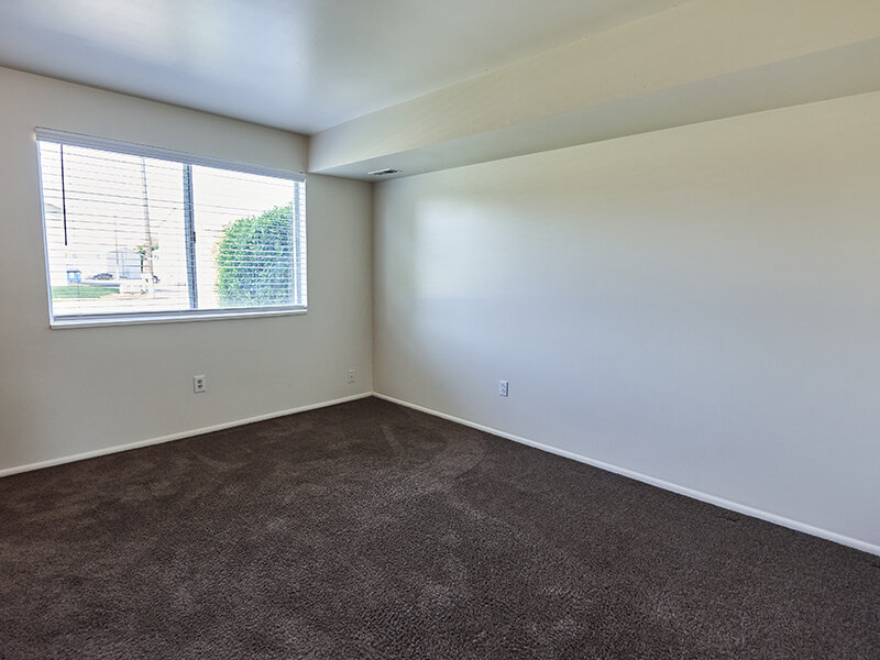 Bedroom with Window and Carpeted Flooring | Kaysville Country Townhomes