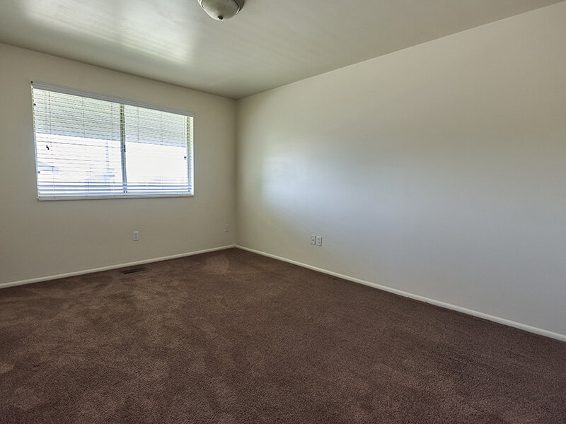Bedroom with Ceiling Light and Carpeted Flooring | Kaysville Country Townhomes