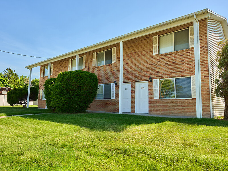 Outdoor View of Apartment Complex with Foliage | Kaysville Country Townhomes