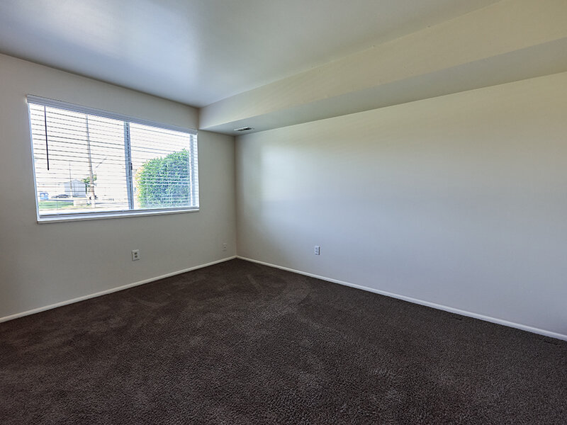 Carpeted Bedroom with Window | Kaysville Country Townhomes