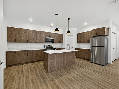 Kitchen with Recessed Lighting and High Ceilings | Kuna Commons