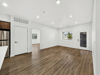 Living Room with Patio Access | Kuna Commons