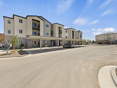 Exterior and Covered Parking | Kuna Commons