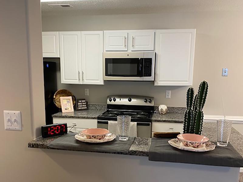 The Lakes at Town Center Apartments have kitchens with a breakfast bar.
