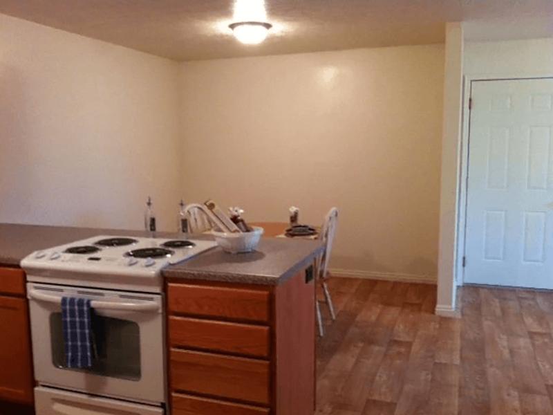 Kitchen and Dining Area | Lakeview Apartments in Tooele, UT