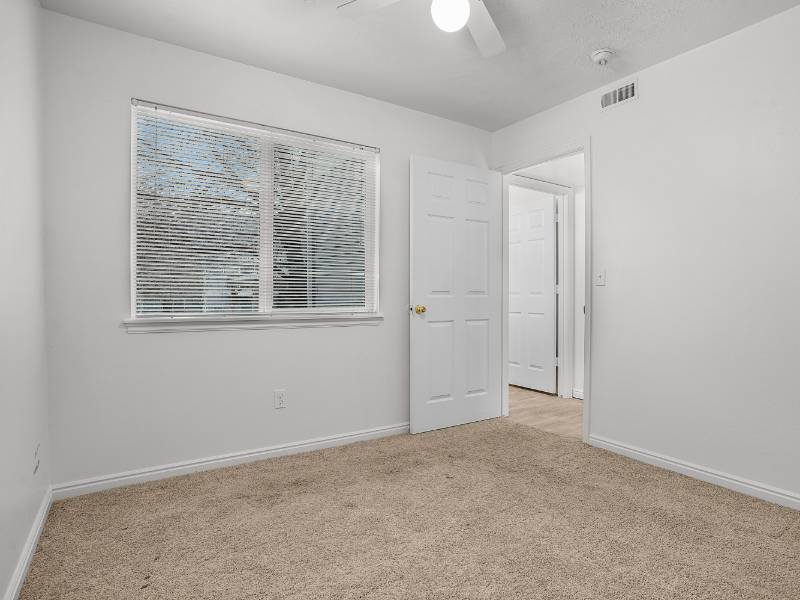 Carpeted Bedrooms | Lakeview Apartments in Tooele, UT