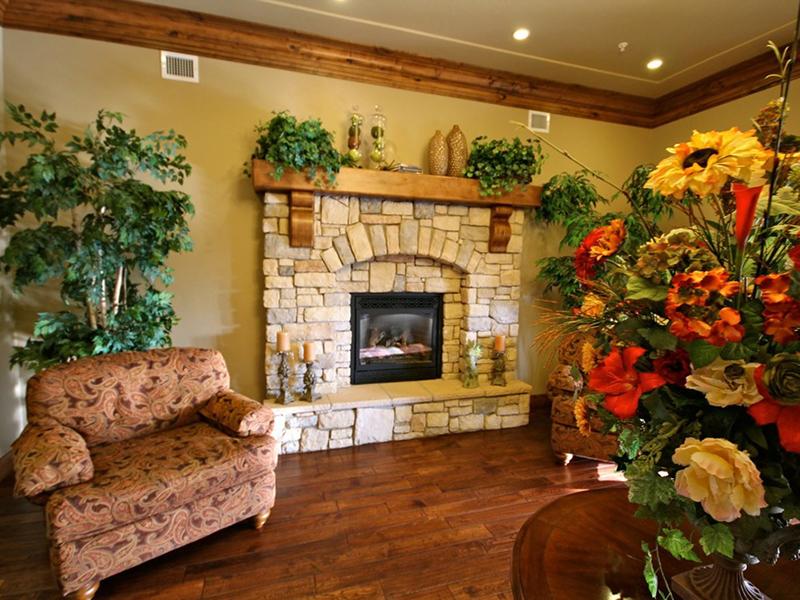 Clubhouse Fireplace | Liberty Square Apartments in Ammon, ID