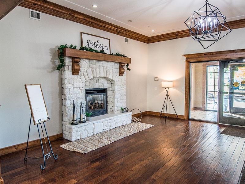 Fireplace Near Entrance | Liberty Square Apartments in Ammon, ID