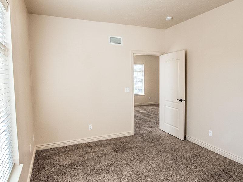 Spacious Bedroom | Liberty Square Apartments in Ammon, ID
