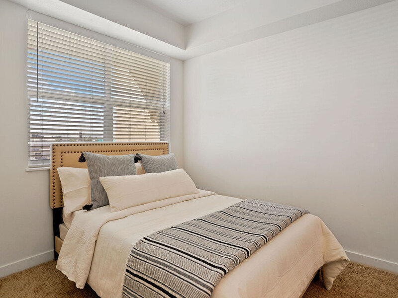 Carpeted Bedroom | Paxton 365 Apartments