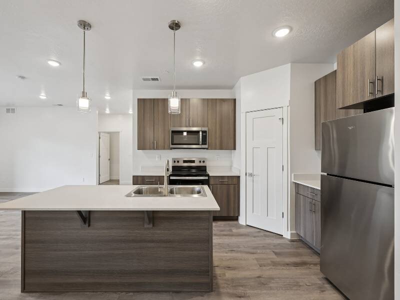 Kitchen with a Kitchen Island | River Meadows Apartments